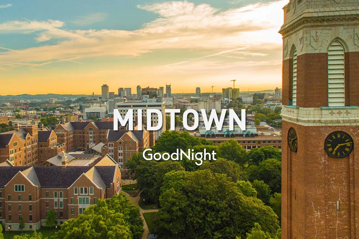 A serene cityscape with the Nashville skyline, historic buildings, and a clock tower framed by green trees. The image suggests opportunities for evening strolls and picnics in the park, aligning with the idea of nearby outdoor activities for families.